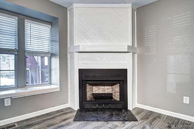 18131 E Arizona Ave Unit F, Aurora, CO 80017 - detailed view of wood finished floors and a fireplace