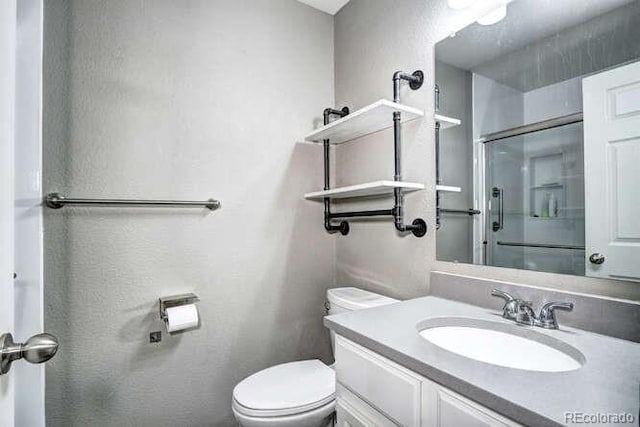 18131 E Arizona Ave Unit F, Aurora, CO 80017 - bathroom with vanity and a shower with door