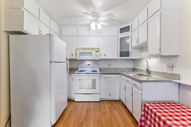 620 S Alton Way Unit 5B, Denver, CO 80247 - kitchen with white appliances, a sink, a ceiling fan, white cabinetry, and light wood-style flooring