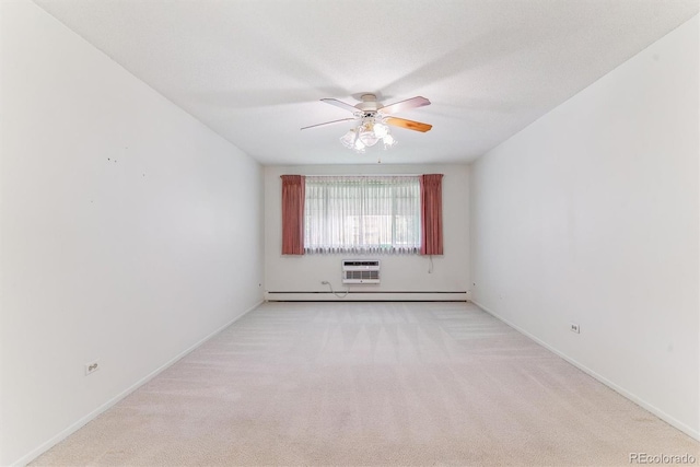 620 S Alton Way Unit 5B, Denver, CO 80247 - unfurnished room featuring carpet, a ceiling fan, a wall mounted AC, and baseboards