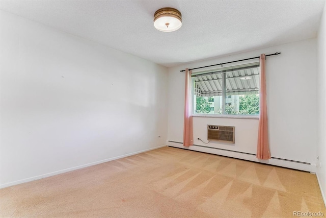 620 S Alton Way Unit 5B, Denver, CO 80247 - unfurnished room featuring a baseboard radiator, carpet flooring, and an AC wall unit