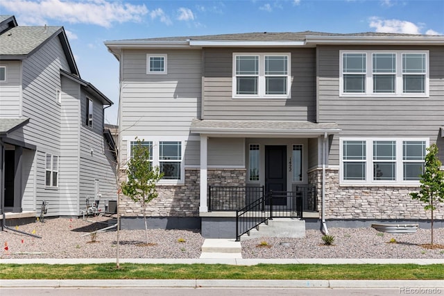 view of front facade featuring stone siding