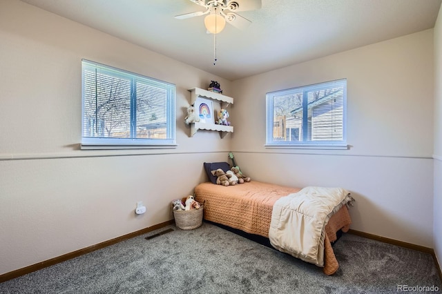 1065 6th St, Berthoud, CO 80513 - carpeted bedroom featuring baseboards and a ceiling fan