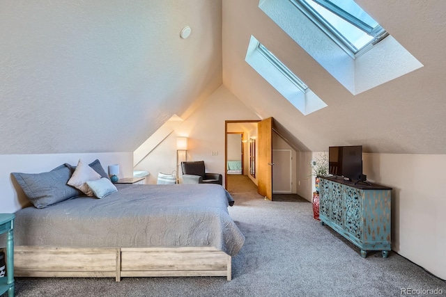 1065 6th St, Berthoud, CO 80513 - carpeted bedroom with a skylight and vaulted ceiling