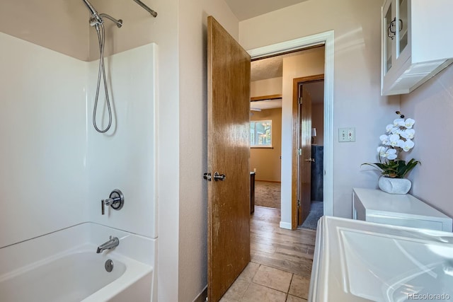 1065 6th St, Berthoud, CO 80513 - full bathroom featuring bathtub / shower combination and tile patterned flooring