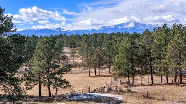 mountain view featuring a rural view