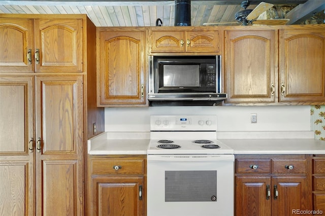 kitchen featuring electric stove and wooden ceiling