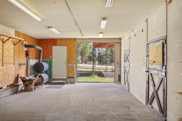 interior space featuring wood walls