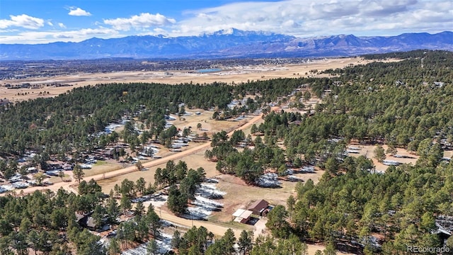 bird's eye view with a mountain view