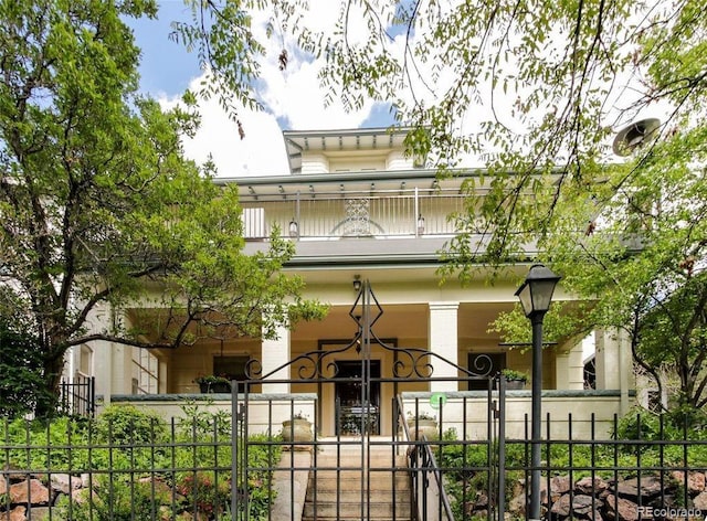 view of property featuring a fenced front yard