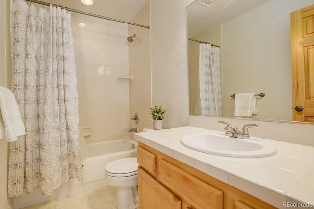 bathroom with tile patterned flooring, shower / bath combination with curtain, toilet, and vanity