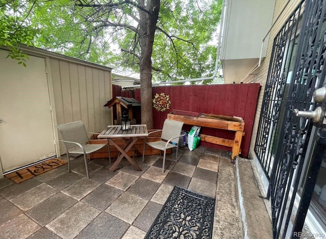 view of patio / terrace with fence