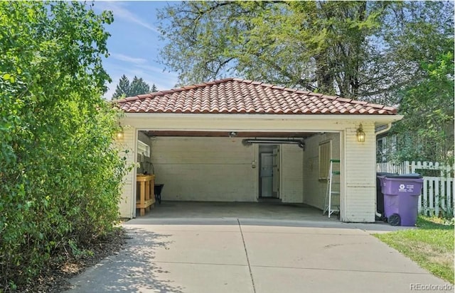 6235 E 6th Avenue Parkway, Denver, CO 80220 - garage featuring fence