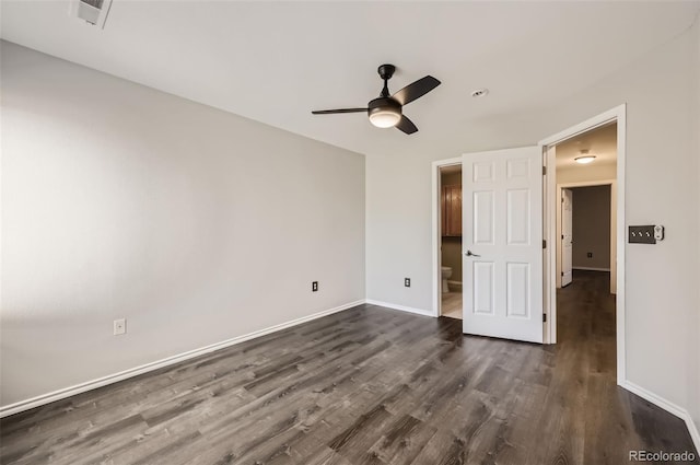 unfurnished bedroom with ceiling fan and dark hardwood / wood-style floors