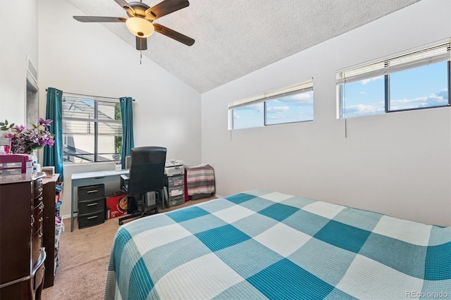 1845 Kendall St Unit 325D, Denver, CO 80214 - carpeted bedroom featuring a textured ceiling, ceiling fan, high vaulted ceiling, and a desk