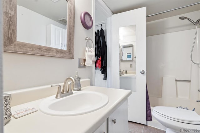 1845 Kendall St Unit 325D, Denver, CO 80214 - bathroom featuring vanity and tile patterned floors