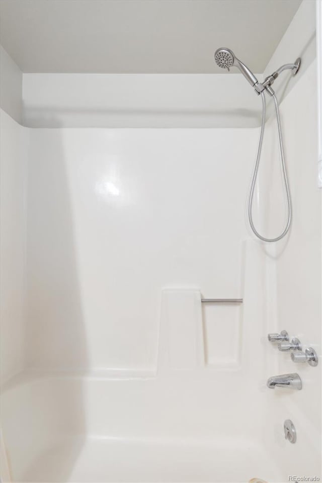 1845 Kendall St Unit 325D, Denver, CO 80214 - bathroom featuring shower / bathtub combination