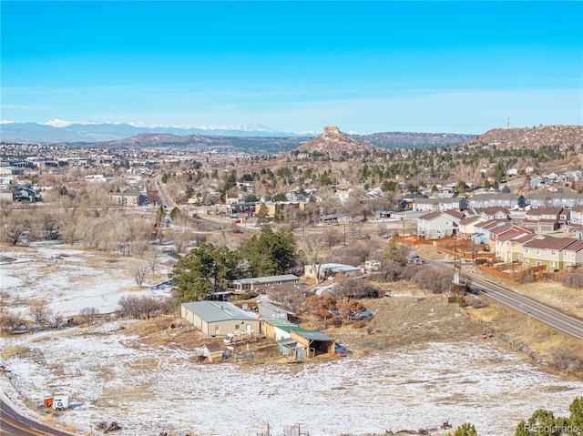 567 Lake Gulch Rd, Castle Rock, CO 80104 - aerial overview of property's location with a mountainous background and nearby suburban area