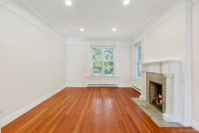 1355 N Franklin St Unit 5, Denver, CO 80218 - unfurnished living room with a baseboard radiator, light wood finished floors, ornamental molding, a tile fireplace, and recessed lighting