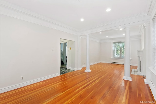 1355 N Franklin St Unit 5, Denver, CO 80218 - spare room with ornate columns, light wood-style floors, ornamental molding, a baseboard heating unit, and recessed lighting