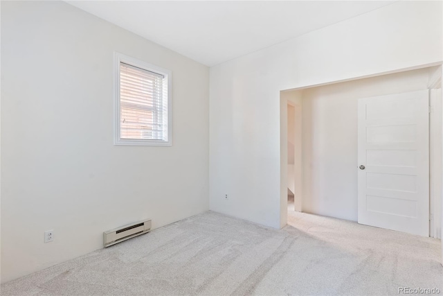 1355 N Franklin St Unit 5, Denver, CO 80218 - carpeted empty room with baseboard heating