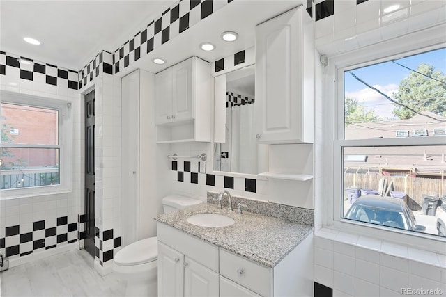 1355 N Franklin St Unit 5, Denver, CO 80218 - full bath featuring vanity, plenty of natural light, recessed lighting, and a shower