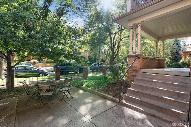 1355 N Franklin St Unit 5, Denver, CO 80218 - porch with outdoor dining area