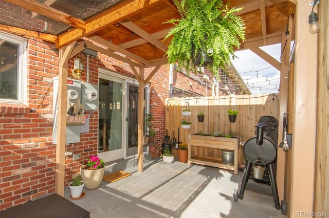 view of patio / terrace with fence