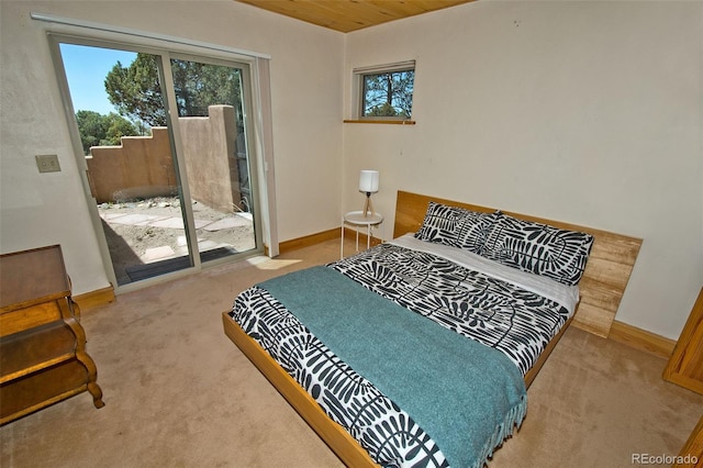 4417 Twinview Ct, Crestone, CO 81131 - carpeted bedroom with access to exterior, multiple windows, baseboards, and wood ceiling