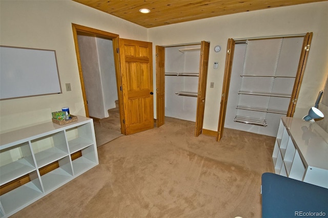 4417 Twinview Ct, Crestone, CO 81131 - bedroom with wood ceiling, light carpet, recessed lighting, and multiple closets