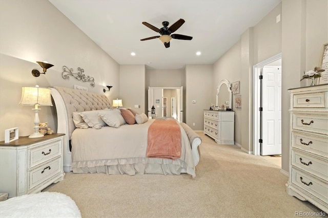 bedroom featuring ceiling fan and light carpet