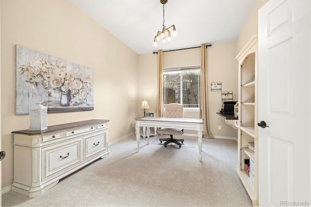 carpeted office space with a notable chandelier