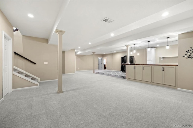 basement featuring light colored carpet