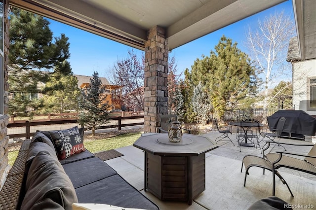 view of patio / terrace featuring an outdoor living space and grilling area