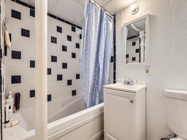 full bathroom featuring shower / bath combo, vanity, and toilet