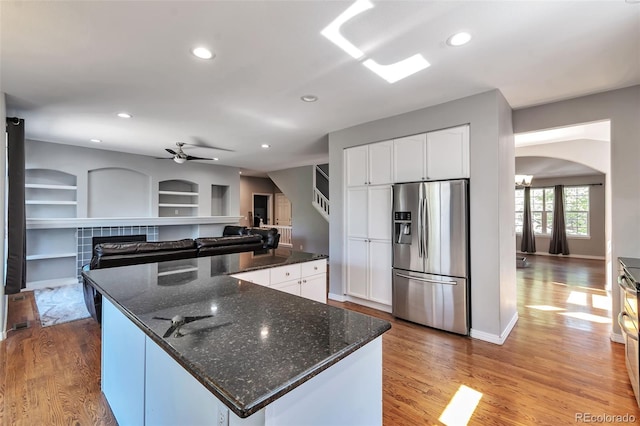 4630 Whitehall Ln, Highlands Ranch, CO 80126 - kitchen featuring stainless steel refrigerator with ice dispenser, light wood finished floors, ceiling fan, white cabinets, and recessed lighting