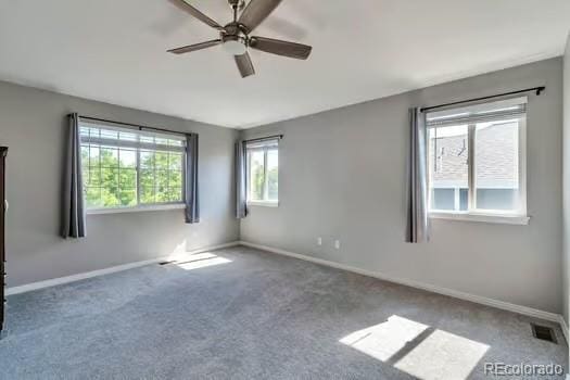 4630 Whitehall Ln, Highlands Ranch, CO 80126 - carpeted spare room featuring a ceiling fan and baseboards