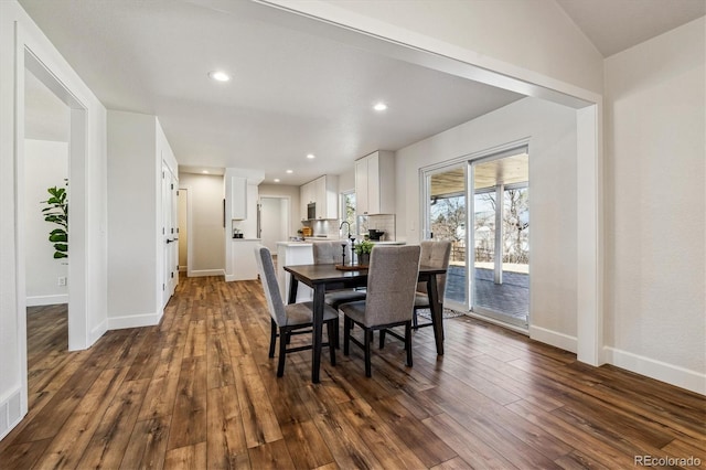 dining area featuring recessed lighting, baseboards, and dark wood-style floors