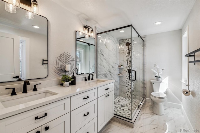 full bath with a stall shower, toilet, marble finish floor, and a sink