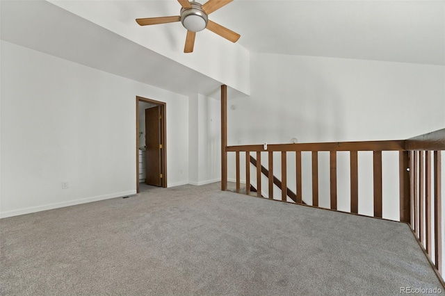 3550 S Harlan St Unit 363, Denver, CO 80235 - unfurnished room featuring carpet, a ceiling fan, and vaulted ceiling