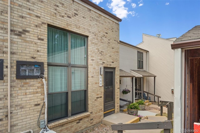 3550 S Harlan St Unit 363, Denver, CO 80235 - view of exterior entry with brick siding
