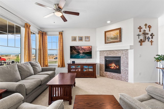 14805 Quince Way, Thornton, CO 80602 - carpeted living area featuring a ceiling fan, a tile fireplace, and recessed lighting
