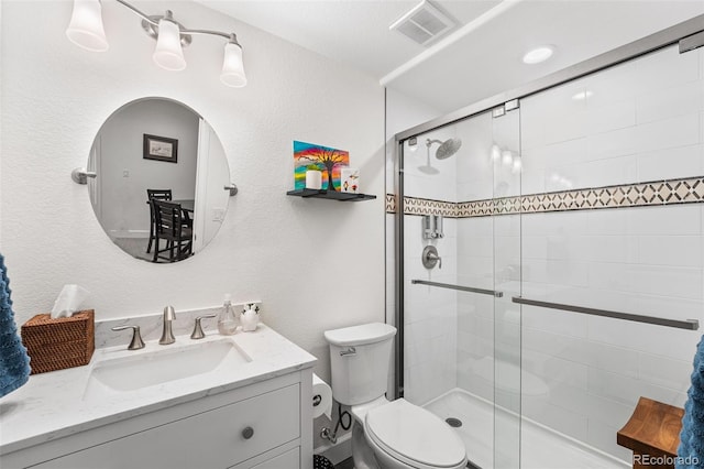 14805 Quince Way, Thornton, CO 80602 - full bath with a shower stall, vanity, and a textured wall