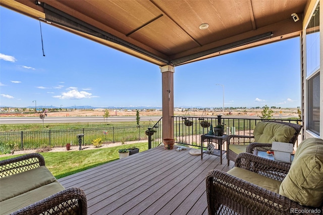 14805 Quince Way, Thornton, CO 80602 - wooden terrace featuring a fenced backyard and a rural view