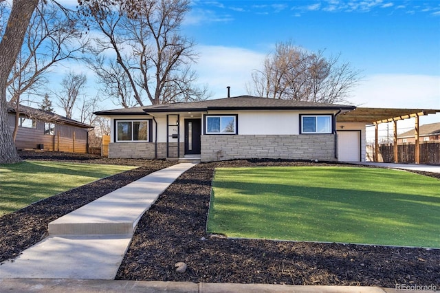 view of front of home with a front lawn, a garage, and a carport