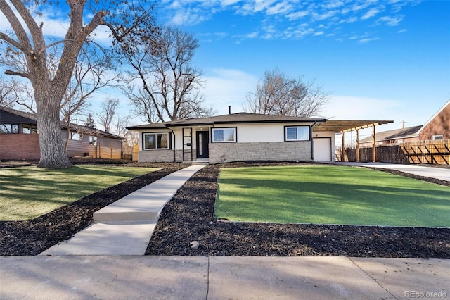 ranch-style home with a front yard and a carport