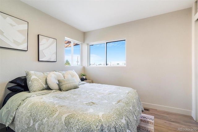 bedroom featuring light hardwood / wood-style floors