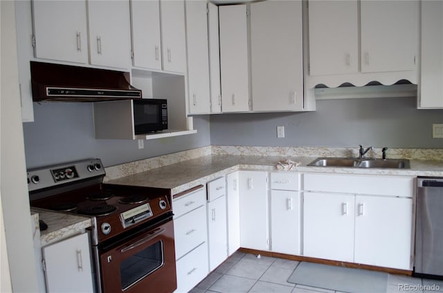 2308 Lelaray St, Colorado Springs, CO 80909 - kitchen featuring stainless steel appliances, range hood, a sink, and light countertops