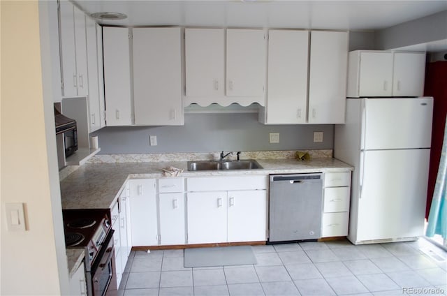 2308 Lelaray St, Colorado Springs, CO 80909 - kitchen featuring appliances with stainless steel finishes, a sink, light countertops, white cabinetry, and light tile patterned flooring