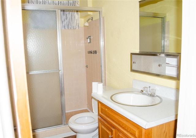 2308 Lelaray St, Colorado Springs, CO 80909 - bathroom with a shower stall, toilet, and vanity